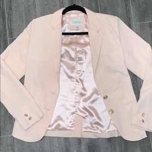 Pink blazer.